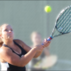 Badger High School tennis player Joanne Walczynski hits a backhand.